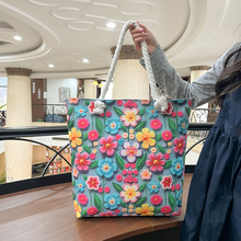 源创新款时尚单肩包碎花撞色托特包大容量沙滩包休闲拎包帆布女包