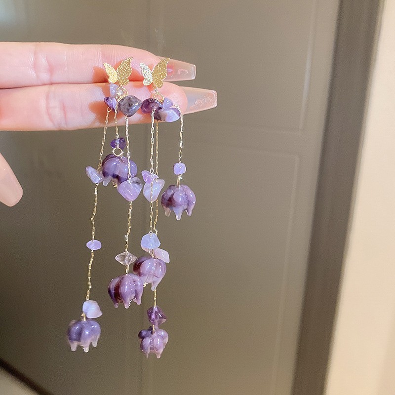 28 # Aguja de plata-oro-púrpura