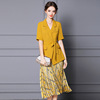 Two piece yellow short sleeve suit with high waist Satin print pleated skirt