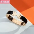 Rose gold and black enamel bracelet