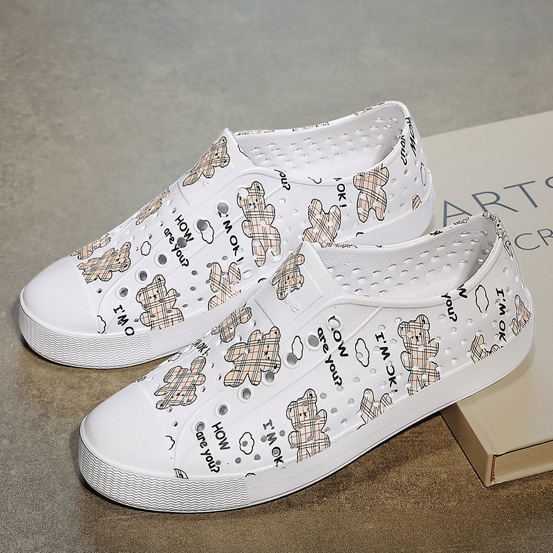 LUCHI zapatos con agujeros pareja verano nuevo estilo graffiti transpirable vadeo hueco hombres y mujeres sandalias de playa casuales en stock