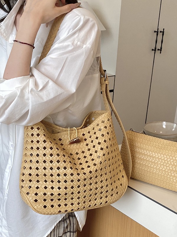 Bolsa de tejido hueco de gran capacidad para mujeres 2026 verano nuevo estilo coreano simple bolso de brazo de viaje bolsa de ocio