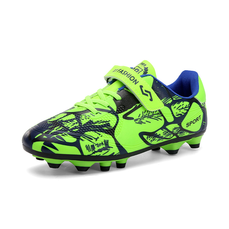 Nuevos zapatos de fútbol transfronterizos transpirables y cómodos para niños y niñas, zapatos de fútbol largos de baja altura, zapatos de césped, estudiantes de competencia