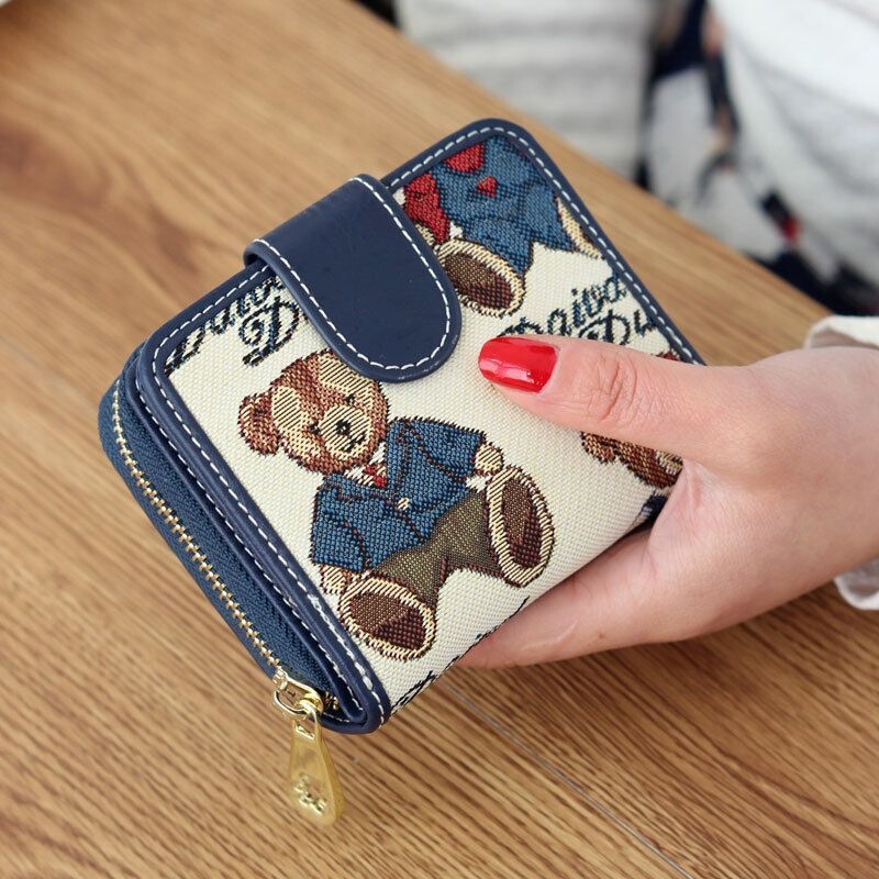 Everyday Winnie the Pooh new women's short wallet, ins-style, Korean version, cute, foldable, fashionable, multifunctional coin purse Everyday Winnie the Pooh new women's short wallet, ins-style, Korean version, cute, foldable, fashionable, multifunctional coin purse