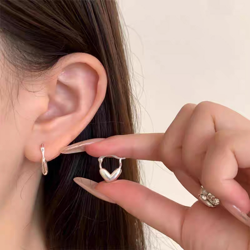 Anillo de metal francés aretes de anillo simple aretes de aretes nuevos estilos de estilo estilo estilo estilo de diseño de nicho temperamento único aretes de mujer cara pequeña