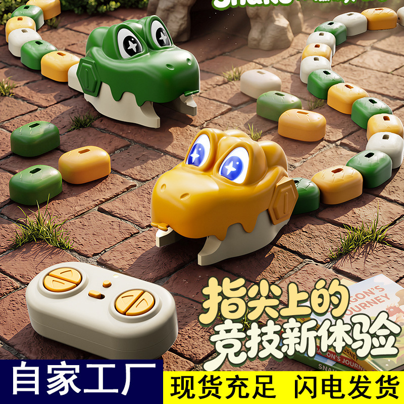 Remote-controlled magnetic snake game, a two-player interactive battle game, a children's electric food-eating car battle toy, for cross-border sales Remote-controlled magnetic snake game, a two-player interactive battle game, a children's electric food-eating car battle toy, for cross-border sales