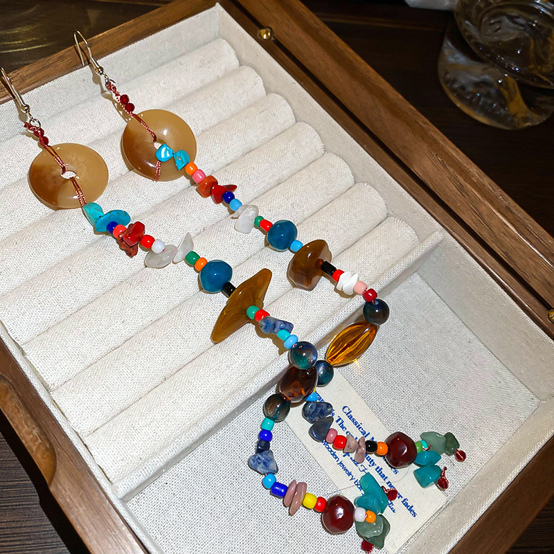 Pendientes de cuentas de resina de color irregular de estilo étnico Pendientes de borla ultralargos Pendientes frescos pequeños retro al por mayor