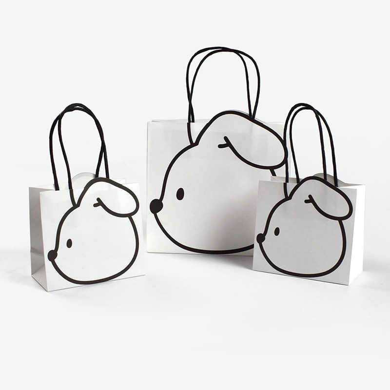 Creative Cartoon Simple Black and White Rabbit Hand Paper Bag Spot Thickened Kraft Paper Children's Day Gift Hand Bag Creative Cartoon Simple Black and White Rabbit Hand Paper Bag Spot Thickened Kraft Paper Children's Day Gift Hand Bag