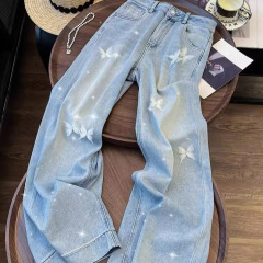 ヨーロッパの新しいスタイルのシンプルなレトロな刺繍入りリボンパンツジーンズハイウエストブルーホットダイヤモンドスリムでハイエンドの女性用