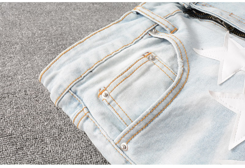 Jean homme slim fit élastique avec trous aux genoux et étoiles_voghion.com