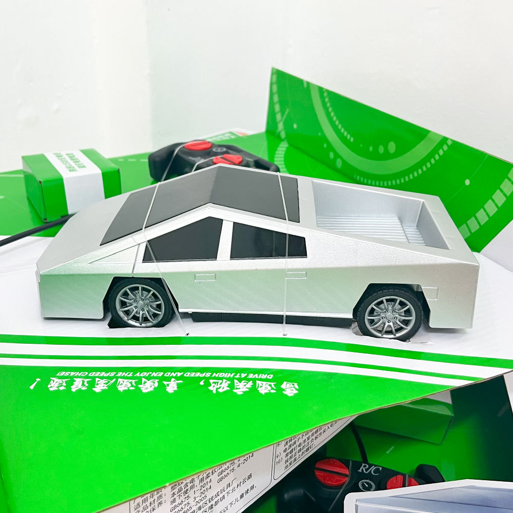 Tesla coche de control remoto juguetes de alta velocidad carga cuatro ruedas coche de escalada cibernético coche de viaje cross-border caja de regalo