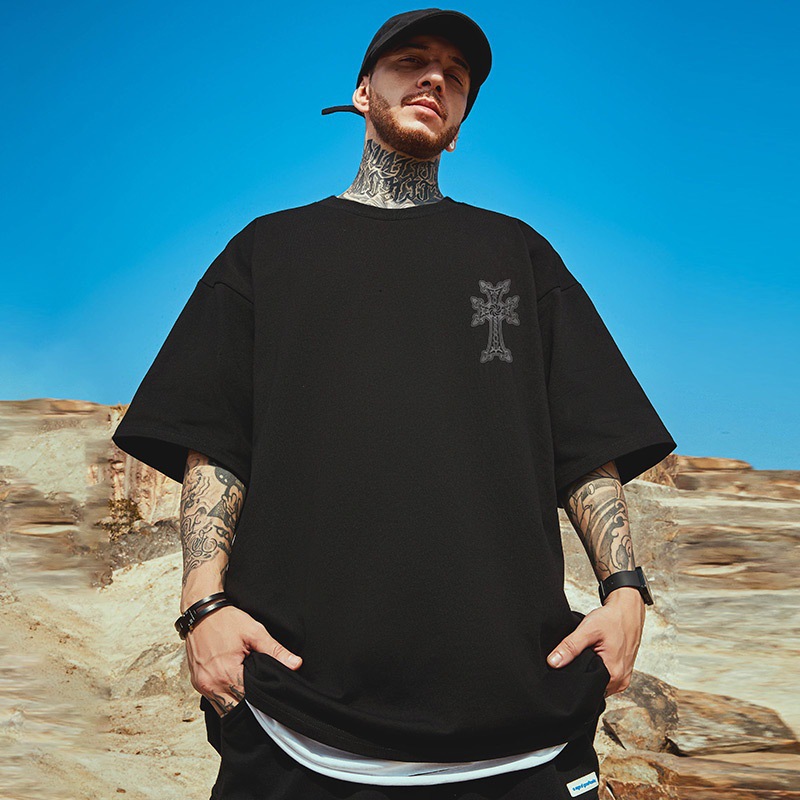 Camiseta de manga corta impresa cuello redondo de los hombres camiseta europea y americana suelta de gran tamaño versátil hip hop Top casual de los hombres