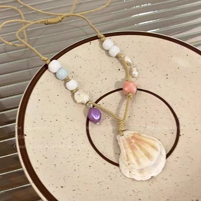 Seaside Holiday Style Shell Necklace Women's Summer 2024 New Hot Style Design Sense Accessories Woven Rope Sweet Clavicle Chain