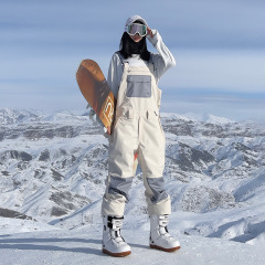 雪怡派単板ストラップスキーズボン防風防水衝突色スキー服連体男女アウトドアスキー装備