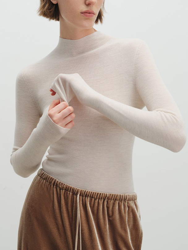 揚子120S極細ウール雲柔感シームレス一体多襟タイプのニット上着の女性