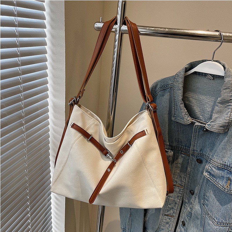 Bolsa de hombro de denim para mujeres 2025 primavera retro alta sensación bolso de hombro de gran capacidad tote bag de viaje