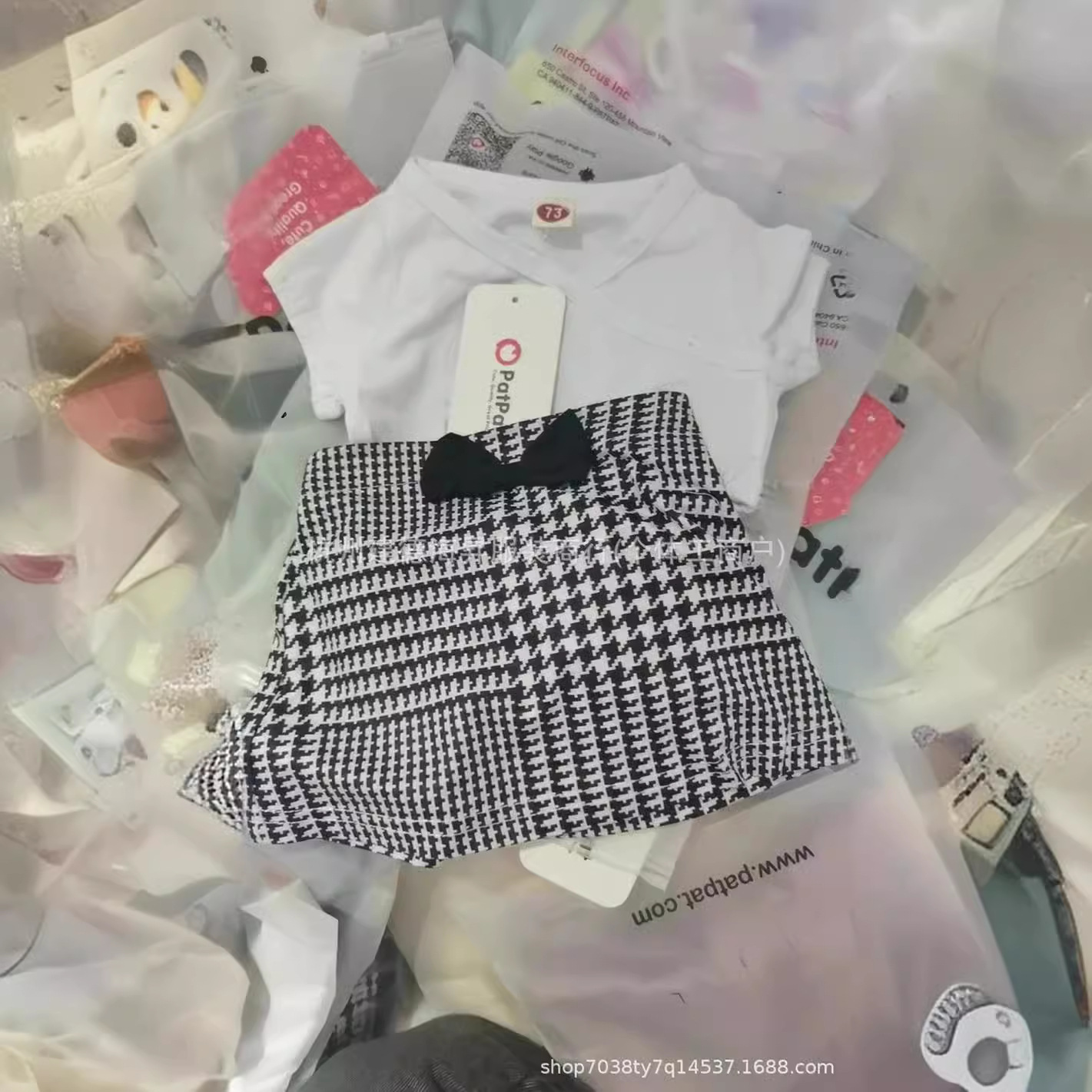 Patpat ropa infantil comercio exterior miscelánea ropa infantil encantadora fábrica de productos de cola de liquidación de ropa de niños transfronterizos