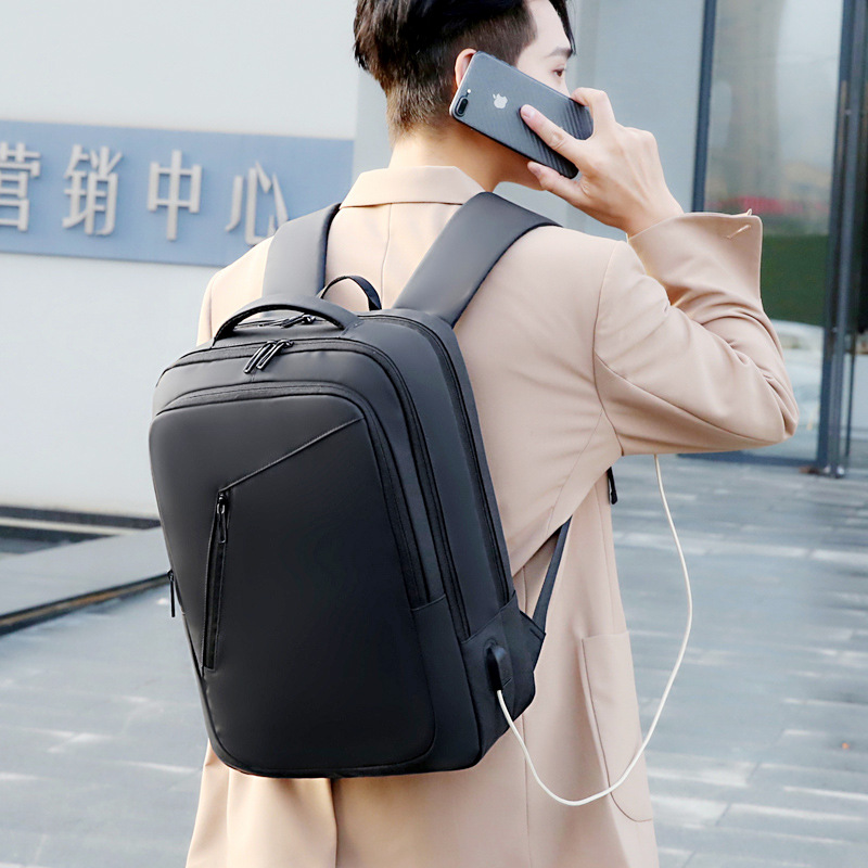 Backpack for business commuting, men's large-capacity USB charging laptop bag, simple and stylish, waterproof, portable travel backpack