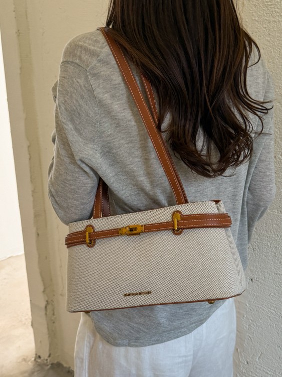 Textura de lino simple versátil alta sensación bolso de hombro de nicho para mujeres de diseño de viaje al trabajo bolsa de ocio