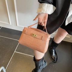 2025 ケリーバッグ女性の外国貿易新高品質ニッチレトロメタルバックルショルダーバッグ通勤多用途クロスボディバッグ