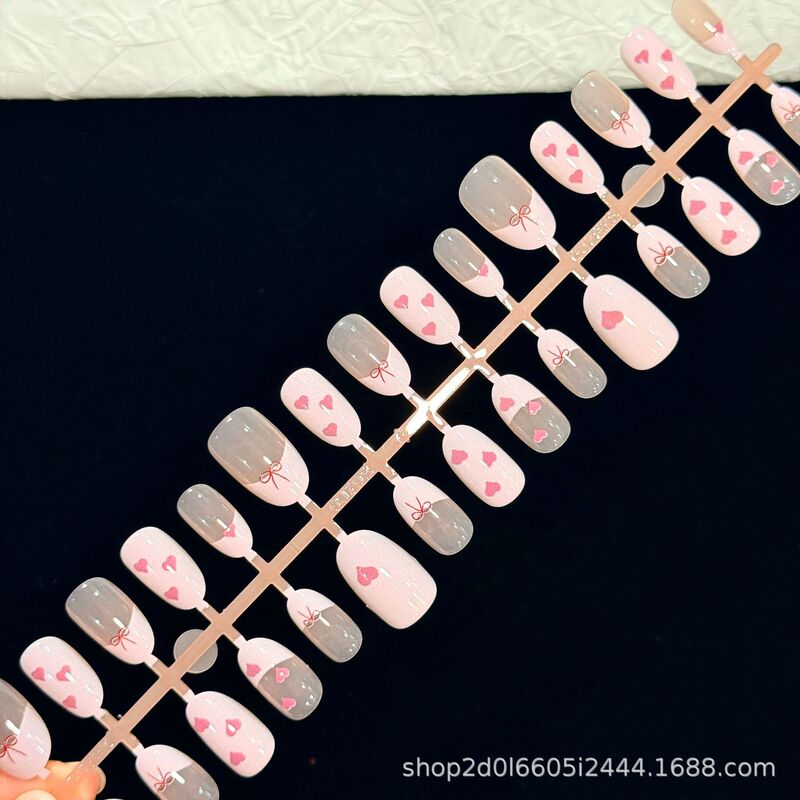 Heart-Shaped Bow Almond Manicure Summer Hot-Selling Pink French Style Pure Handmade Pre-Made Wearable Nail Tips Wholesale Heart-Shaped Bow Almond Manicure Summer Hot-Selling Pink French Style Pure Handmade Pre-Made Wearable Nail Tips Wholesale