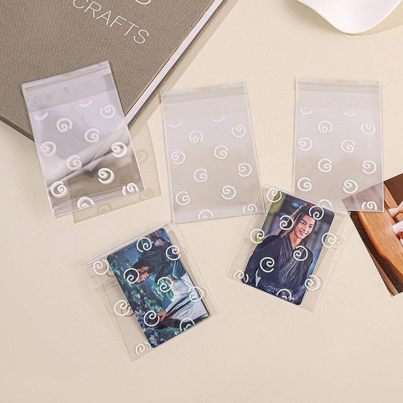 Spot de alto valor, estilo de círculo de tarjeta de viento de 50, una bolsa autoadhesiva, paquete opp, bolsa pequeña, lote de bolsa de embalaje