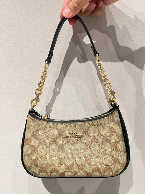 Классическая универсальная сумка-точка? (Human: The first item: "Classic universal handheld summer shoulder bag, chain, one-shoulder bag" -> "Классическая универсальная сумка через плечо летом, цепочка, односторонняя сумка"