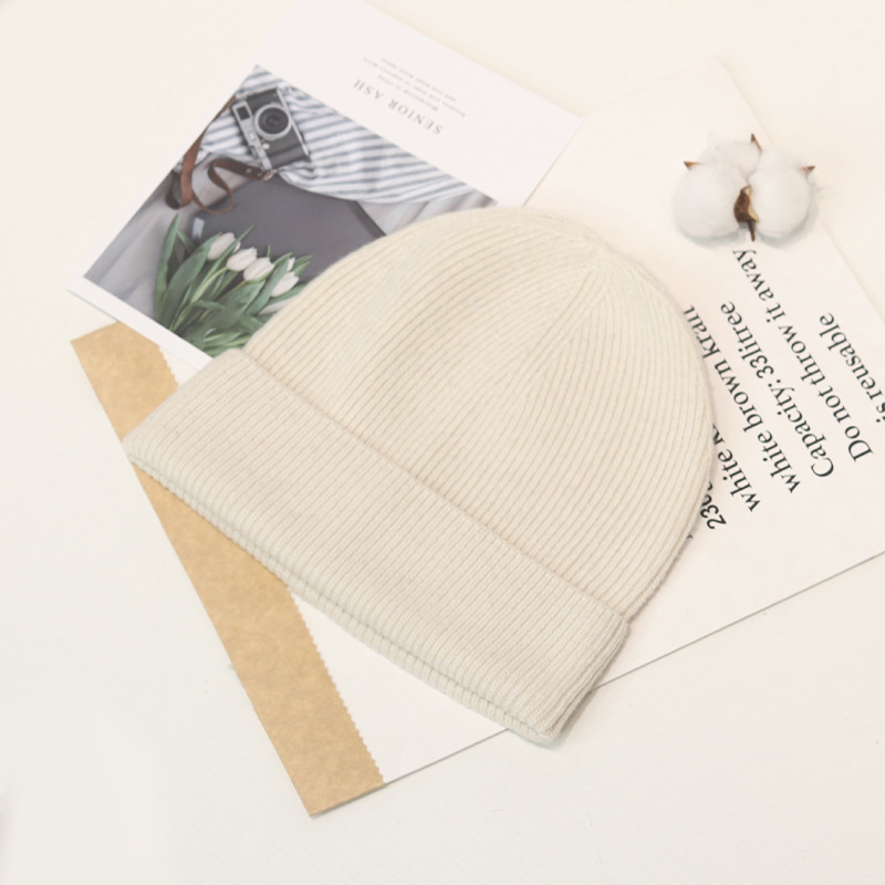 Estilo coreano de moda todo fósforo de color sólido sombrero de punto de una sola capa cómodo sombrero de lana suave y rizado otoño e invierno hombres y mujeres mismo cálido