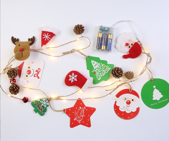 LED de iluminación de Navidad campana Pino cono Cadena de luz aguja de pino fruta roja Cadena de luz decorativa batería Cadena de luz interior luz de color al por mayor