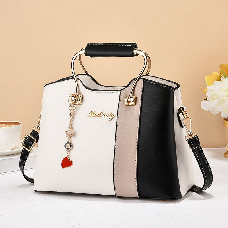 Elegante dama 2023 verano nueva moda mamá bolsa fábrica correo directo popular solo hombro bolsa de mensajero Comercio exterior todo partido