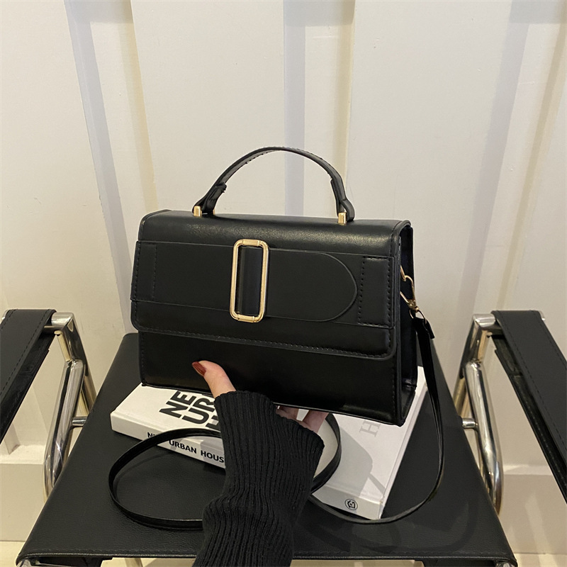 Bolso cuadrado pequeño estilo retro de Hong Kong para mujer 2024 nuevo bolso de mensajero portátil de moda coreana otoño e invierno bolso de hombro con textura de color sólido