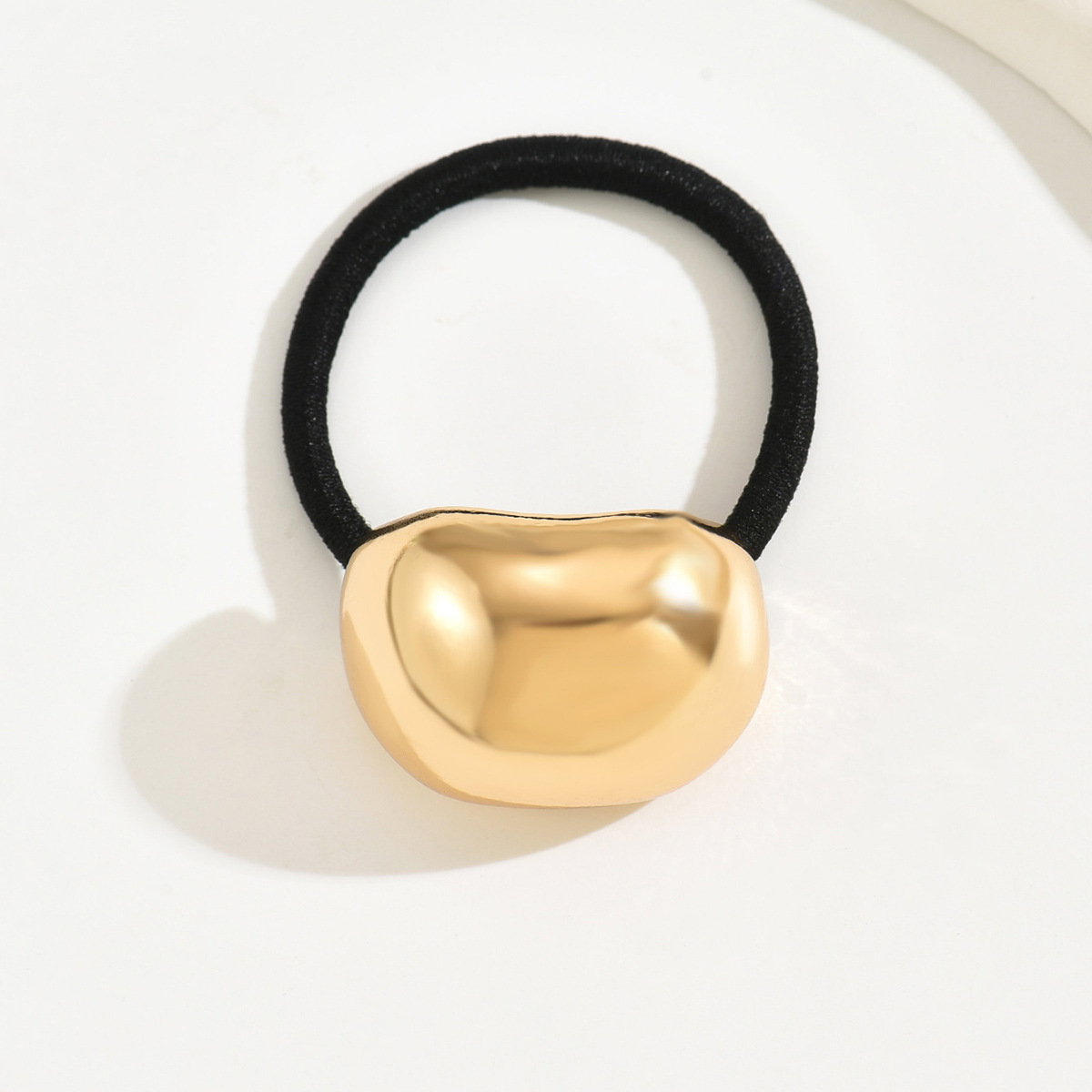 Europa y los Estados Unidos populares aire frío cóncavo elástico temperamento metal anillo de cabello anillo de cabello universal amor retro cuerda de cabeza