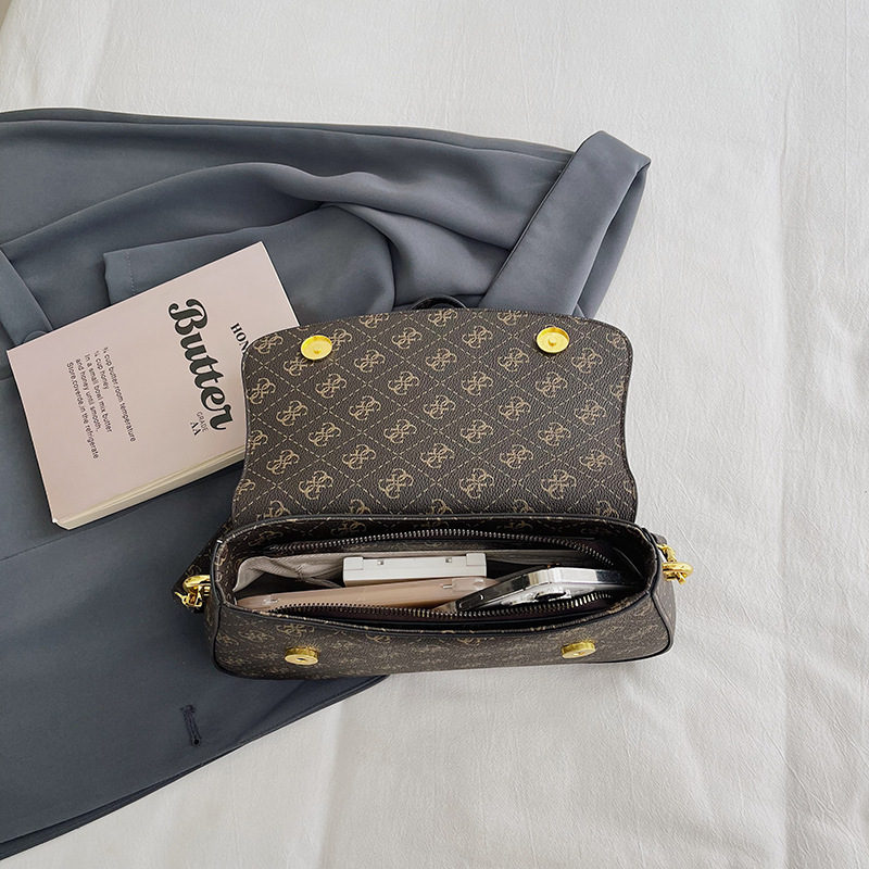 Bolsos transfronterizos para mujer 2024 nuevo estilo de alta gama bolso de axila de lujo simple y ligero con estampado de diamantes bolso de mensajero de todo fósforo