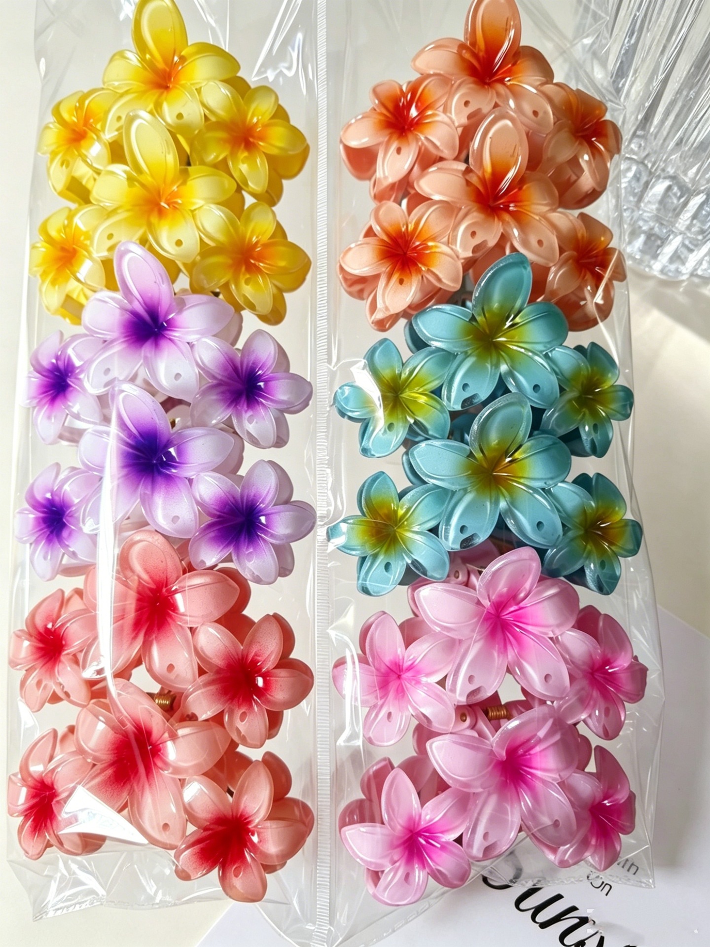 Vacancias de verano transfronterizas huevo flor clip para el cabello de mujeres tarjeta de sensibilidad avanzada 2026 nuevo conjunto de adornos para el cabello de flores laterales image 15