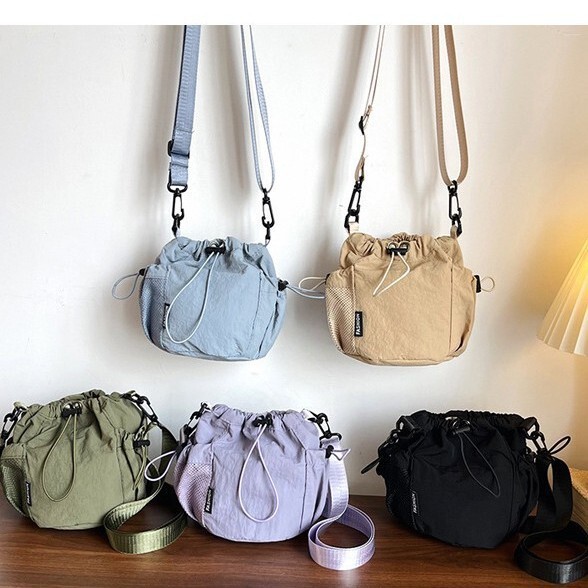 Cross-border casual outdoor women's shoulder bag, nylon drawstring crossbody bag, large-capacity fabric bucket shoulder bag for women Cross-border casual outdoor women's shoulder bag, nylon drawstring crossbody bag, large-capacity fabric bucket shoulder bag for women