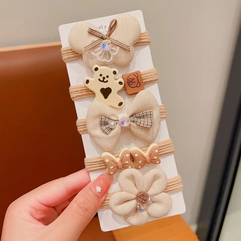 Cute anillo de cabello de color leche 2026 nuevo cabello de niños de alta elasticidad correa de goma duradera para niñas atadas cabello de cabello