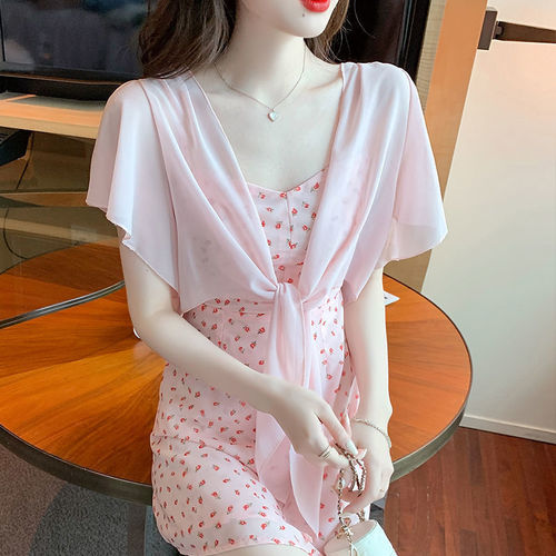 A light and breezy summer tank top dress with a small shoulder shawl, paired with an open front cardigan for added warmth and breathability, perfect for sunny days.