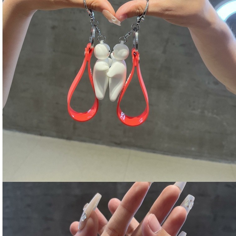 ディザトーンの同じタイプの磁気吸引抱っこのキーホルダーのカップルはプレゼントを貼って彼氏の彼女のカップルにプレゼントします。