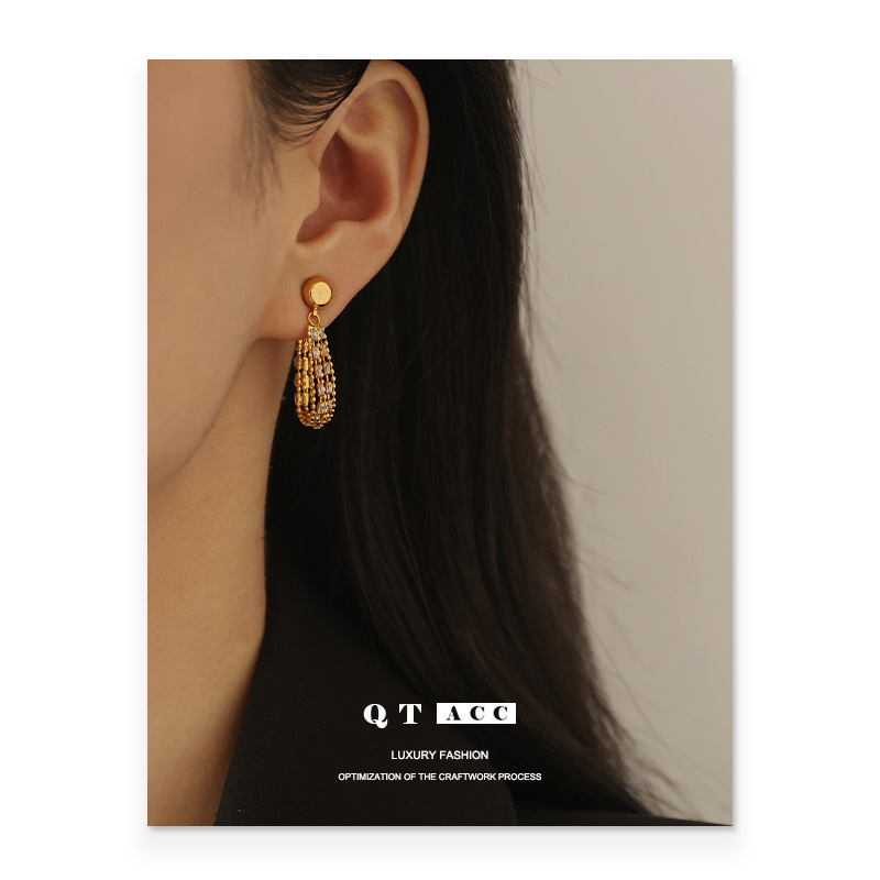 Latón chapado 18K oro real diseño temperamento earless pendientes al por mayor vintage ZIRCON borla oído clip de hueso para las mujeres
