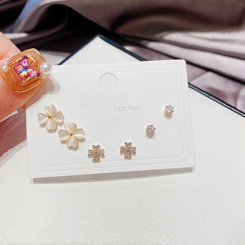 Korean Style Cat's Eye Zircon Four-leaf Clover Earrings Set Wholesale Jewelry Nihaojewelry display picture 1