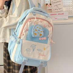 2025 夏の新スクールバッグ女性のプリント中学生バックパックファッション多用途大容量バックパックファッション