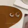 Golden earrings from pearl