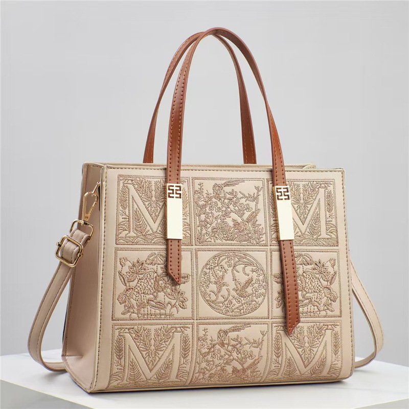 Bolsos bordados de estilo nacional, bolsos de hombro, bolsos de mochila, moda de 2025 nuevas bolsas de madres, bolsas simples