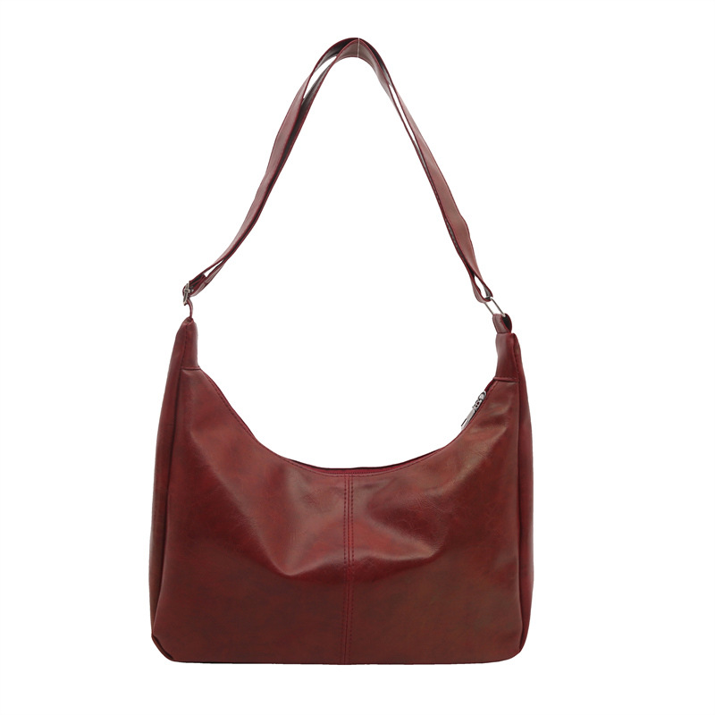 Moda de viaje de moda de gran capacidad bolsas de color sólido para mujeres 20 simple retro nuevo hombro bolsas coreanas transfronterizas