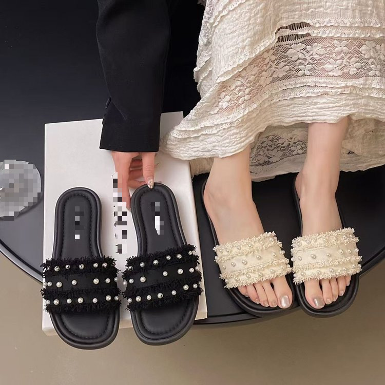 Zapatillas de perla con sandalias de falda 2026 verano nuevo tacones bajos casuales cómodas zapatillas de viento