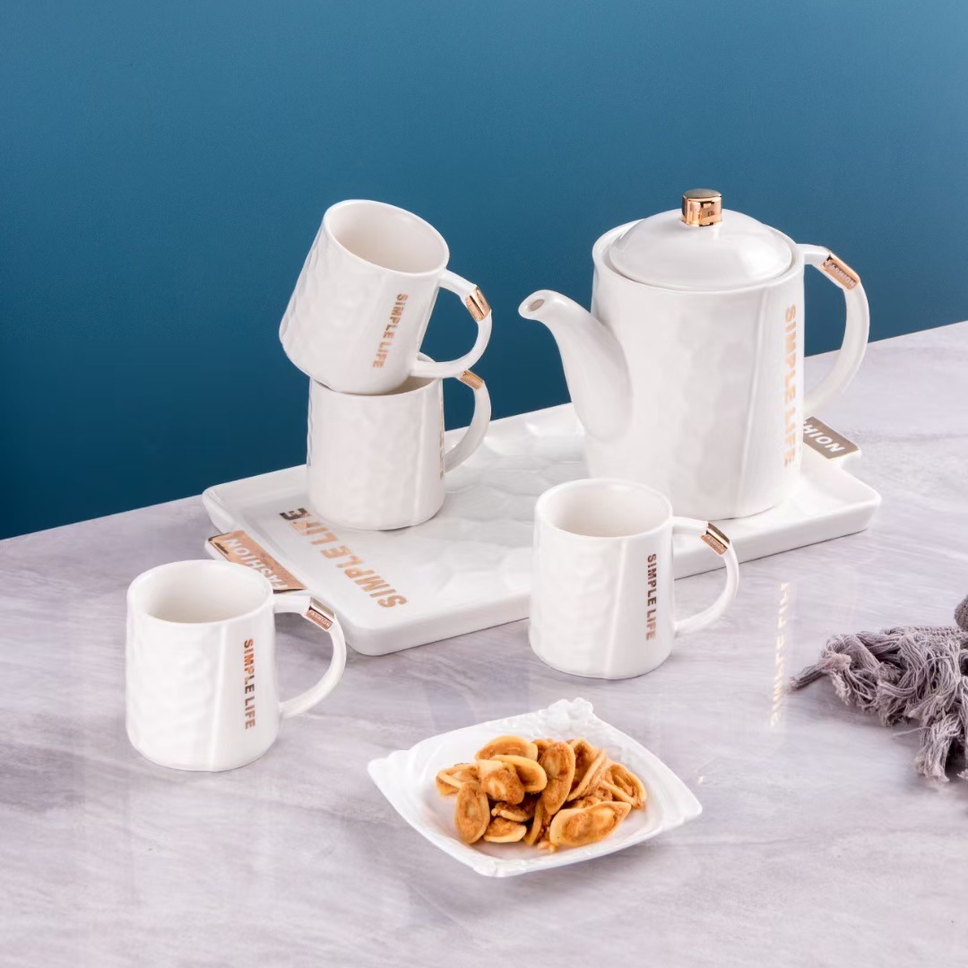 Estilo nórdico simple en relieve de cerámica botella agua fría combinación traje personalidad Oficina flor tetera con bandeja