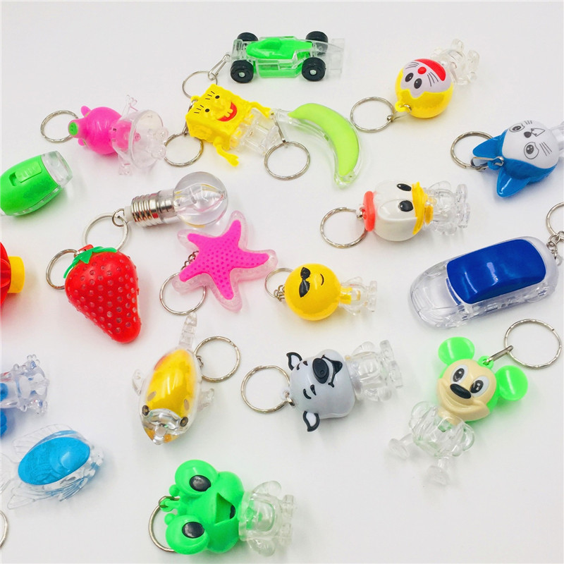 LED de dibujos animados luminoso llavero lámpara de color bolsos creativos colgantes juguetes luminosos para niños micro comercio escaneo de código pequeño regalo