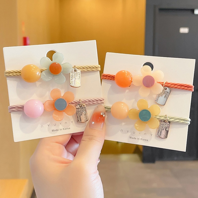 Japonés y coreano Super Hada red cabeza roja cuerda flor redonda banda de goma simple todo-fósforo de la moda de alta apariencia linda chica horquilla