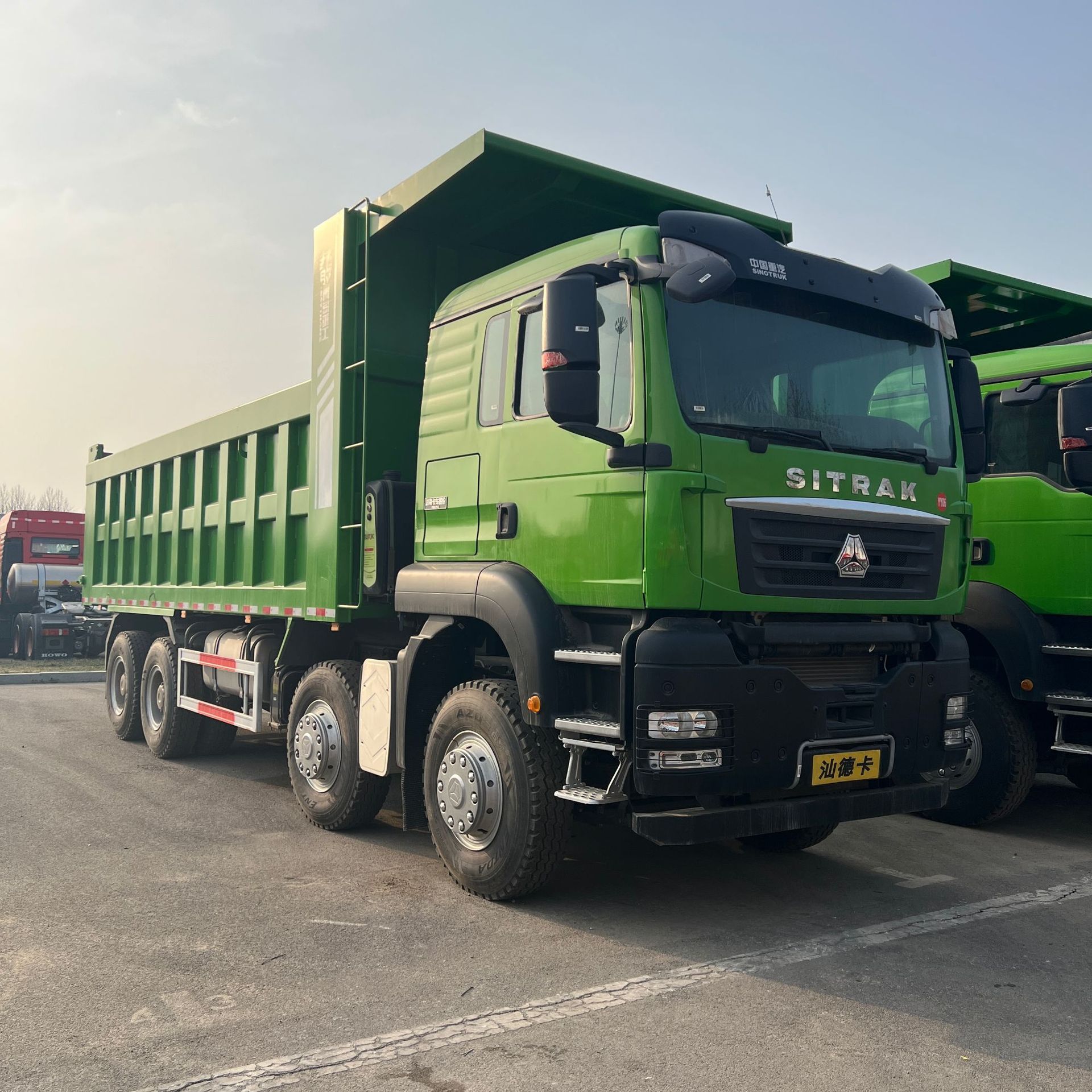 Exported to China: Sinotruk Sitrak Front-Four-Wheel-Drive Rear-Eight-Wheel Dump Truck, Specialized for Transporting Gravel and Soil