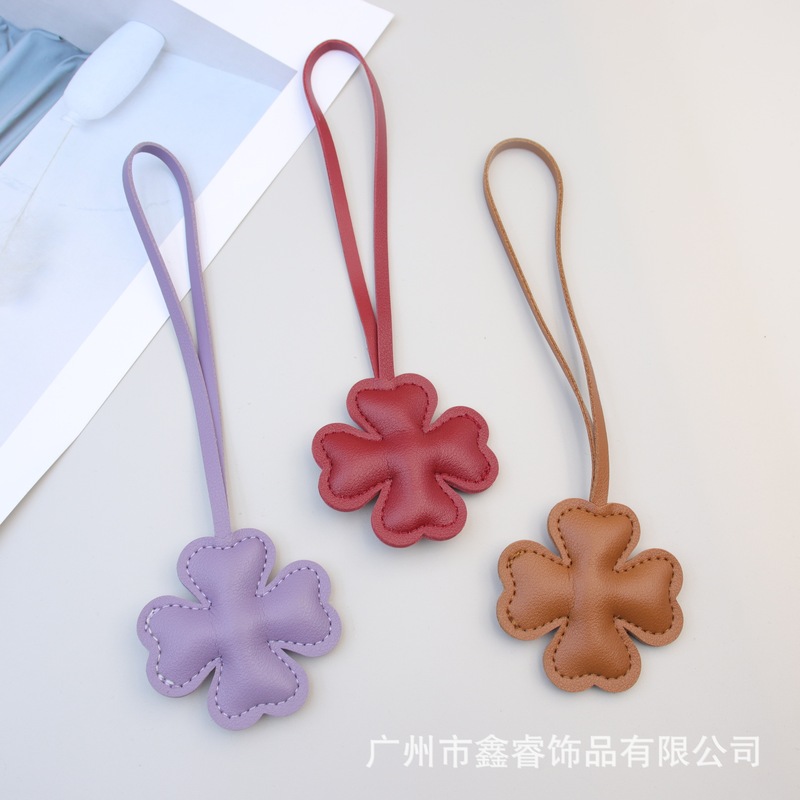 New Leather Flower Key Lanyard Pendant, Simple and High-End Four-Leaf Clover Bag Charm, Couple Bag Accessory New Leather Flower Key Lanyard Pendant, Simple and High-End Four-Leaf Clover Bag Charm, Couple Bag Accessory